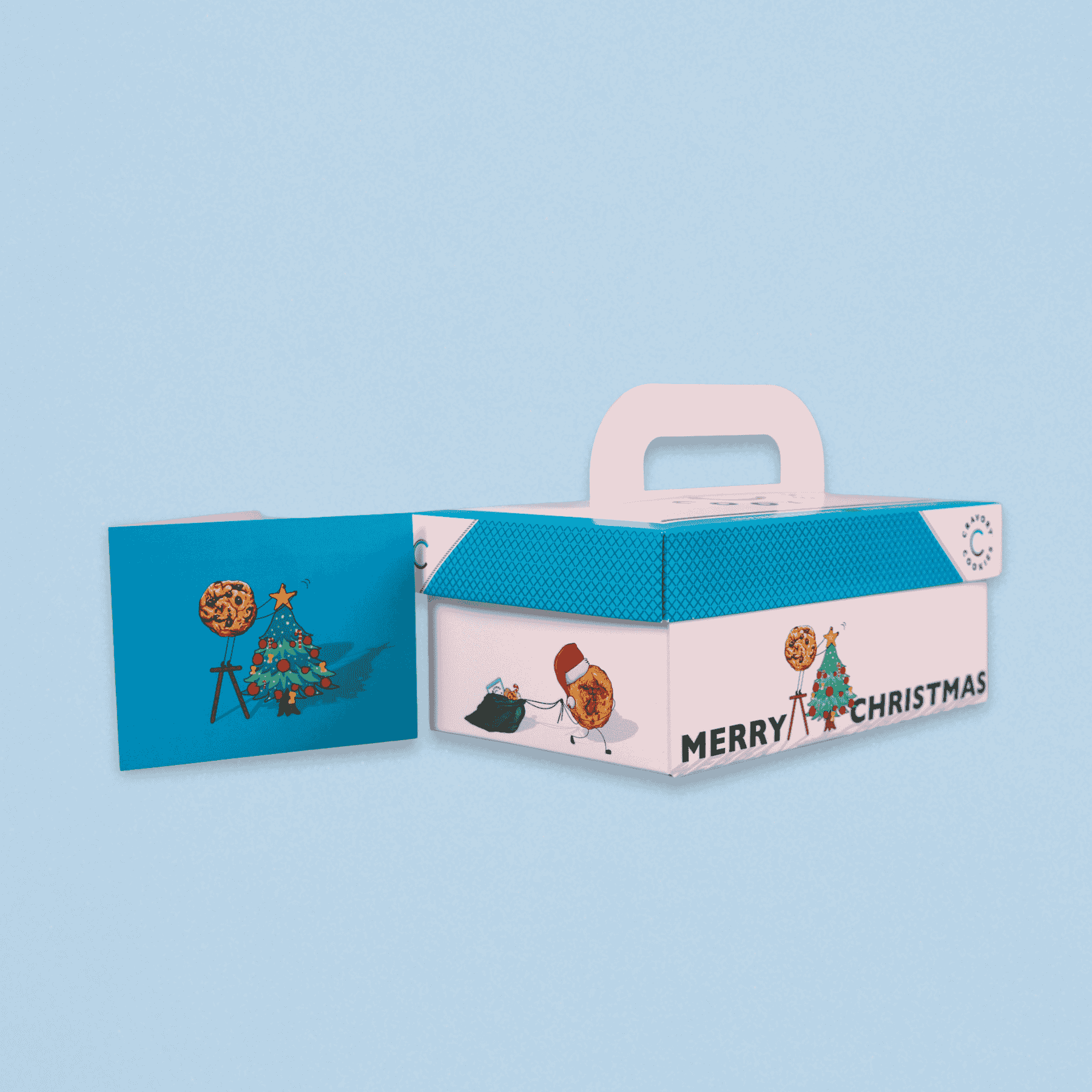 Cardboard gift box with 'Merry Christmas' text and illustrations on a light blue background